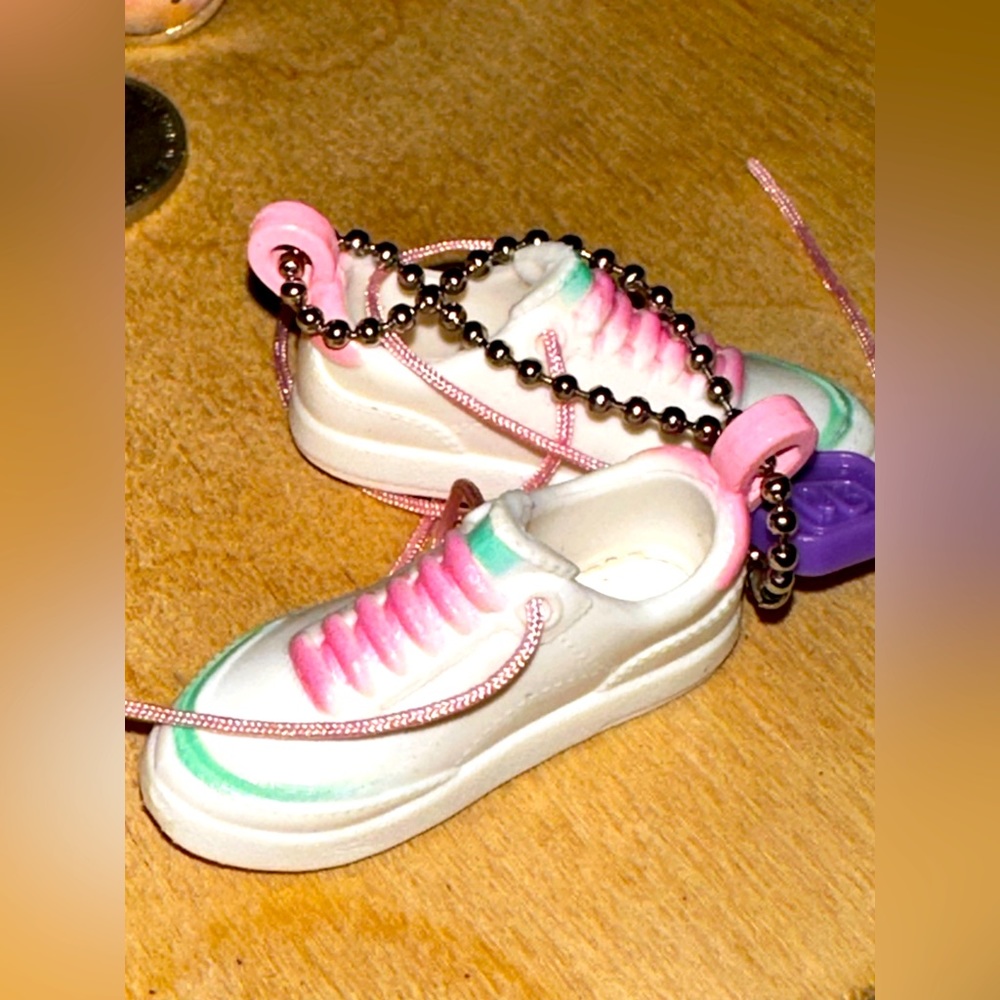 Sneakers, keychain or bag charm. NWT. Cute. Great stocking stuffers or filler.